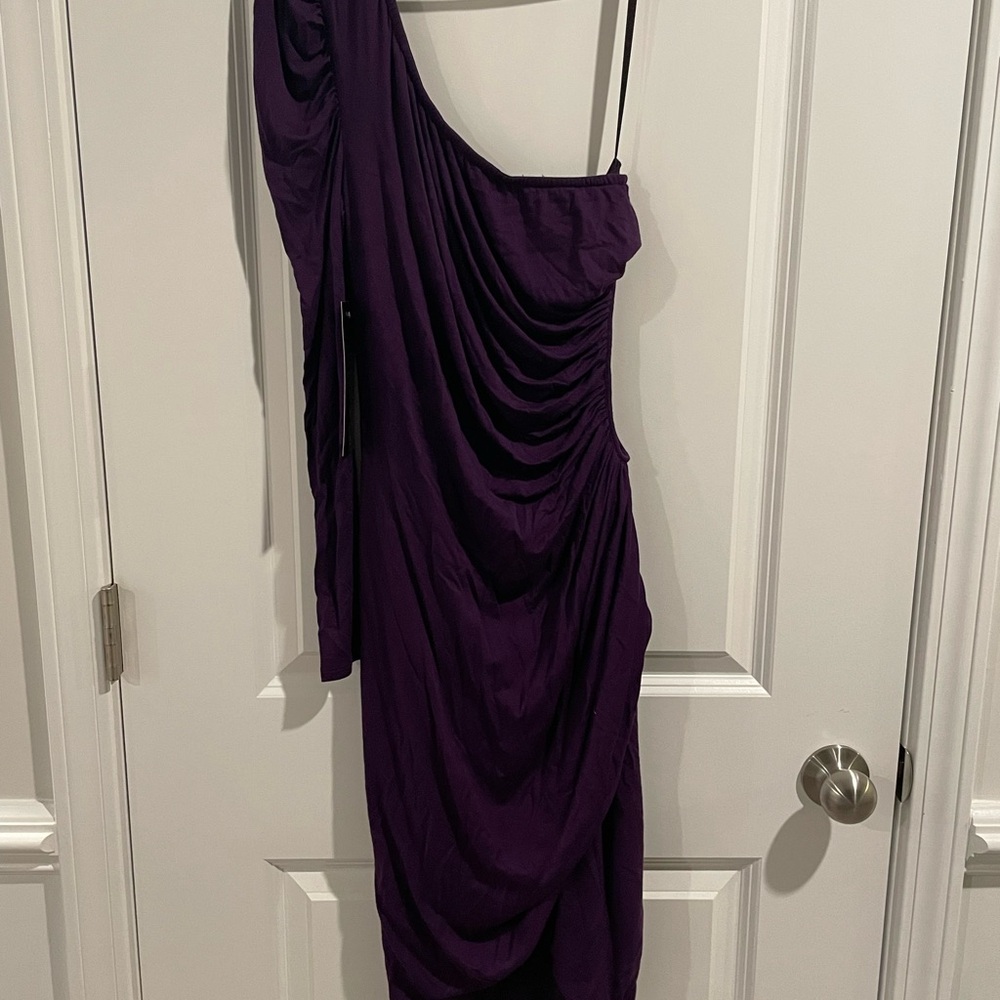 Bebe purple one shoulder cut out dress in size M
